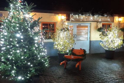 Lime Kiln gastropub external picture taken at might with Christmas tree and lights